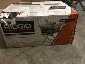 Ridgid  15 Amp 10 in. Table Saw with Folding Stand not used R45171
