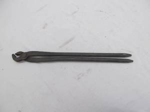 lot 24 image: antique black smith tool