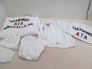 lot 63 image: Martial art uniforms