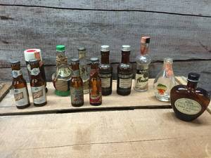lot 70 image: Vintage Beer, Liquor Bottle Advertisers, Salt and Peppers