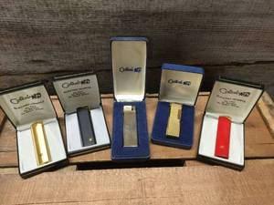 lot 72 image: 5 Vintage Colibri Pocket Lighters with Cases