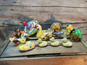 lot 87 image: Group Vintage Windup Tin Toys