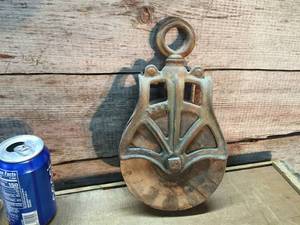 lot 89 image: Antique Cast and Wood PulleyBlock