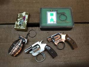 lot 140 image: Group Mini Grenade-Gun Lighters - Musical Lighter