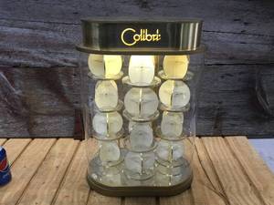 lot 184 image: Amazing Vintage Colibri Light-Up Rotating Pocket Lighter Display Cabinet
