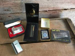 lot 232 image: 5 Vintage Pocket Lighters