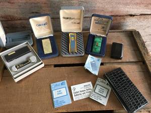 lot 233 image: 5 Vintage Colibri Pocket Lighters with Cases, Plus