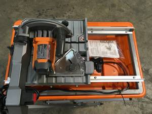Ridgid 9 Amp Corded 7 in. Wet Tile Saw with Stand not used see pictures