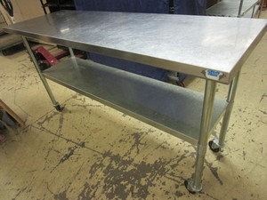 STAINLESS STEEL COUNTER, ON CASTERS