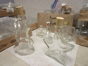 BUNNY, STAR-SHAPED DECORATIVE BOTTLES WITH CORKS, OTHER ASSORTED BOTTLES