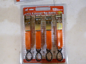 lot 22 image: White Dog 4 Piece Ratchet Tie-Downs