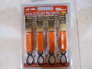 lot 23 image: White Dog 4 Piece Ratchet Tie-Downs