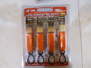 lot 24 image: White Dog 4 Piece Ratchet Tie-Downs