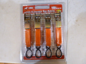 lot 25 image: White Dog 4 Piece Ratchet Tie-Downs