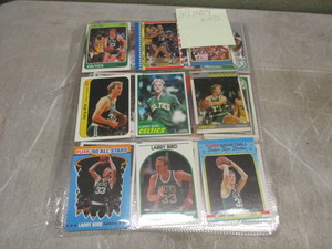 45 Larry Bird cards in pages, All different some as old as 81