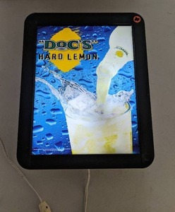 lot 83 image: Anheuser Busch Docs Hard Lemon Light Up Bar Sign