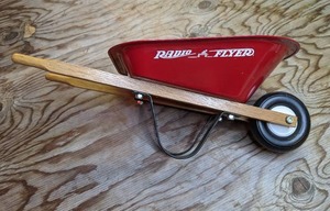 lot 279 image: Mini Radio Flyer Metal Wheelbarrow