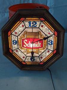 lot 91 image: Schmidt Octagonal Lighted Wall Clock