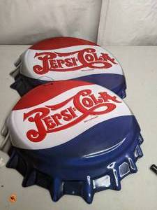 lot 406 image: Pair of Oversized Pepsi-Cola Bottle Cap Wall Hangings