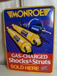 lot 410 image: Vintage Monroe Struts Metal Sign
