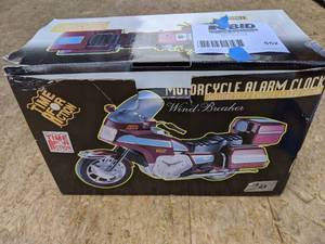 lot 552 image: Motorcycle Alarm Clock