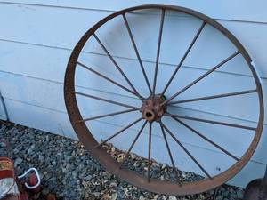 lot 1584 image: Antique Metal Wagon wheel (800)