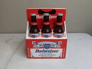 lot 337 image: Americas Favorites Ceramic Budweiser Six Pack Piggy Bank