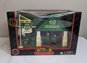 lot 353 image: Roadside Memories Quaker State Gas Station Scale Replica in Box