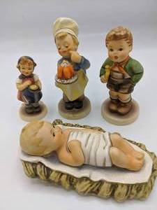 lot 911 image: Four Hummel Figurines
