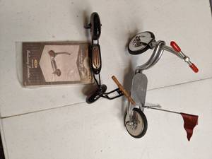 lot 690 image: Miniature Toy Scooters
