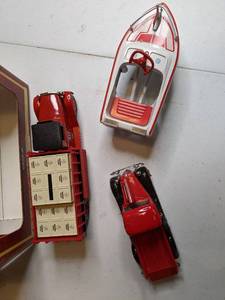 lot 1302 image: Vintage Toy Vechiles- Jolly Roger, Diamond T Truck, and Studebaker