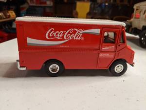 lot 1303 image: Vintage Coca Cola Trucks