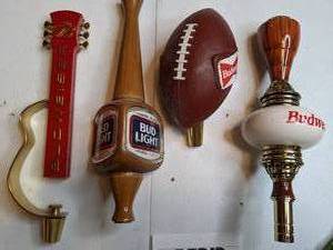 lot 1315 image: Vintage Wooden Budweiser Tap Handles