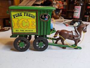 lot 1319 image: ANTIQUEVINTAGE CAST IRON HORSE MAN AND WAGON TOY PURE FRESH ICE AND 2 OTHER CAST IRON TOYS