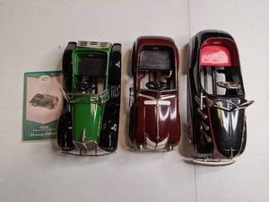 lot 677 image: Collectible Hallmark Kiddie Car Classics Vintage Pedal Car Replicas
