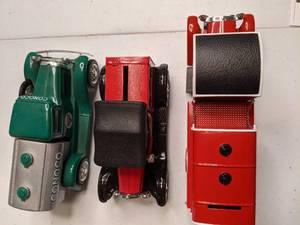 lot 682 image: Texaco, Conoco, and Mills Replica Advertising Trucks