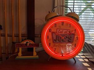 lot 394 image: Joes Diner Tabletop Clock & Citylights Monopoly Lighted Sign
