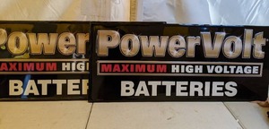 lot 1015 image: Pair of PowerVolt Batteries Metal Signs