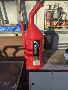 lot 990 image: Plastic NASCAR Gas Can