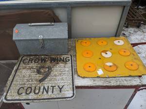 lot 1583 image: County Sign, Reflective Sign (with some damage), and a Custom Tool Box