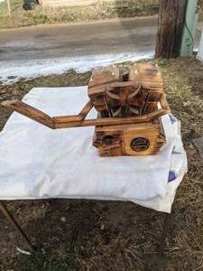 lot 814 image: Custom Wooden Harley motor art piece  with Maltese Cross