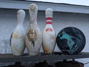 lot 877 image: Brunswick Bowling Ball and Three Pins