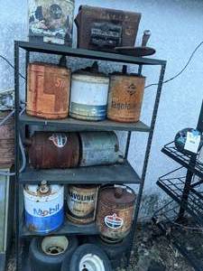 lot 878 image: Metal Shelving Unit with Vintage Gas and Oil Cans