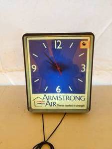 lot 216 image: Armstrong Air Lighted Wall Clock