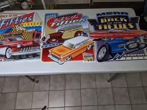lot 970 image: Three Metal Minnesota Hot Rod Signs