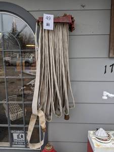 lot 49 image: Emergency Fire Hose and Hanging Rack
