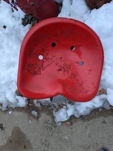 lot 1410 image: Vintage Red Tractor Seat