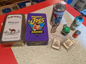lot 1378 image: Assortment of Vintage Novelty Lighters and Tin Match boxes  full of matches