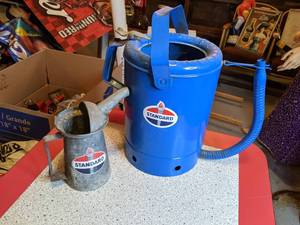 lot 1387 image: Standard Oil cans and Oil Spout