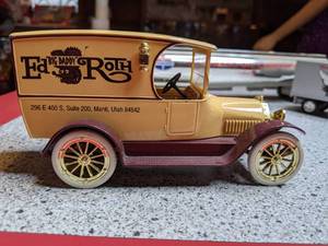 lot 1338 image: Collectible Trucks and Coin Bank